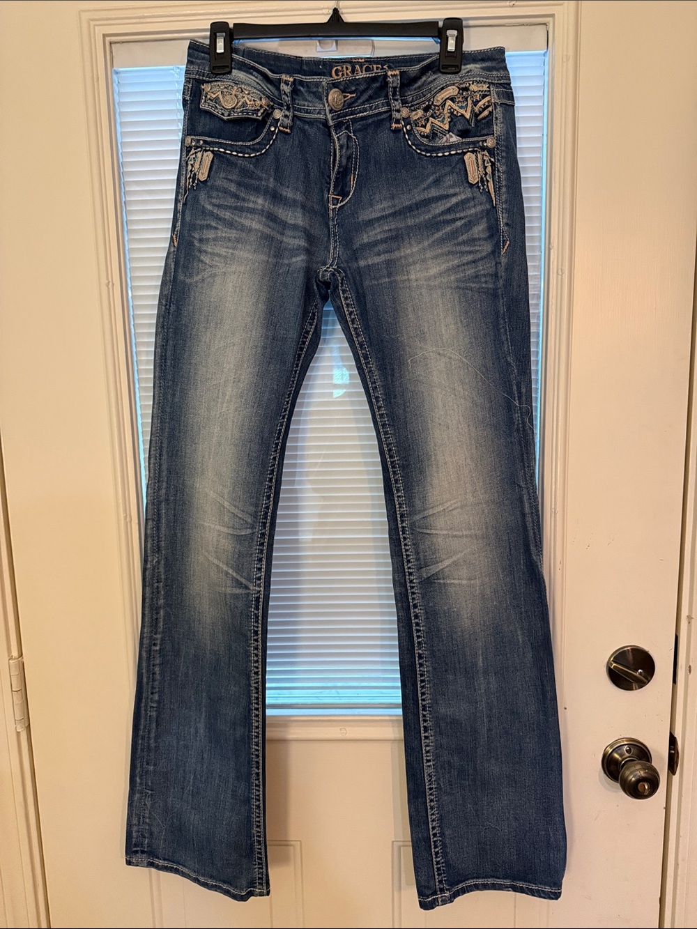 Grace in LA Distressed Medium Blue Flare Jeans